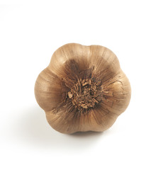 Wall Mural - black garlic on a white background