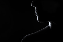 Silhouette Of A Woman Face In Black And White Rim Lighting