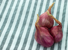 Fresh Onions On Black White And Red Checkered Cotton Napkin