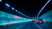 Car Driving Through Tunnel