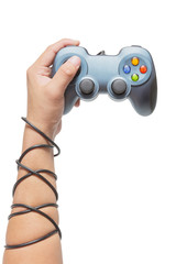 hand holding game controller and tied up with cables