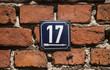 Weathered enameled plate number 17