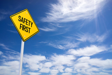 Safety First Road Sign and Blue Sky