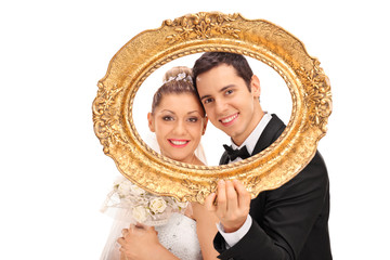 Poster - Couple posing behind vintage picture frame