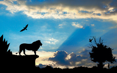 Wall Mural - Jungle with mountains, old tree, birds lion and meerkat on blue cloudy sunset background