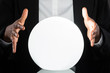 Businessperson Predicting Future With Crystal Ball