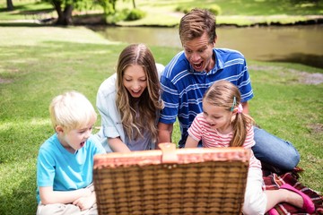 Wall Mural - Happy family having a picnic