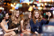 © Syda Productions - women with champagne taking selfie at night club