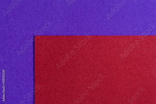 Fotografija Eva foam ethylene vinyl acetate red surface on purple sponge plush background