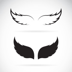 Wall Mural - Vector black wing icon on white background