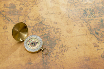 Wall Mural - old compass on vintage map