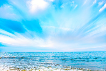 Tropical beach and blue sea with waves