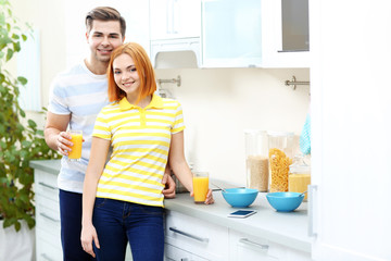 Sticker - Happy couple have healthy breakfast on the kitchen