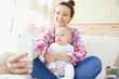 © Africa Studio - Young mother taking a selfie with her baby
