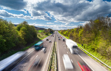 Vehicles In Motion On Busy Rural Motorway