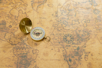 Wall Mural - old compass on vintage map