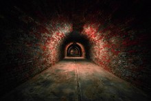 Long Underground Brick Tunnel Angle Shot