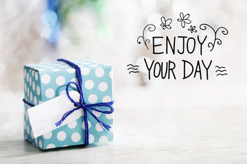 Wall Mural - Enjoy Your Day message with gift box