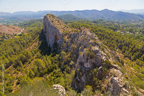 Fotografie, Obraz Rugged terrain near Spanish town Xativa in Valencia province