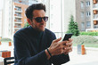 © marjan4782 - Young businessman using a smartphone