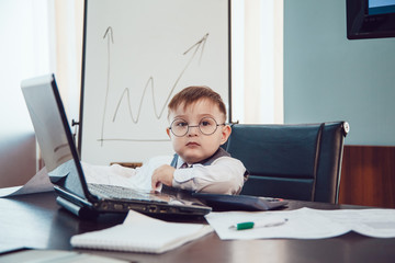 Children businessmen are meeting in the office