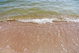 Fototapeta Morze - волны и камни на морском берегу