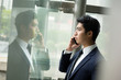 © leungchopan - Businessman talk to cellphone