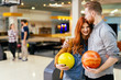 © NDABCREATIVITY - Beautiful couple dating and bowling
