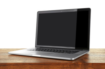 Sticker - Laptop with black screen on wooden table against white background