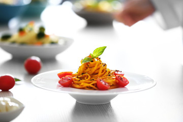 Canvas Print - Delicious pasta salad on the table closeup