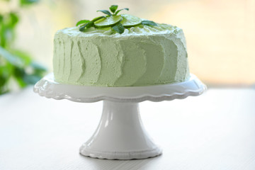 Poster - Big lime cake on a white stand