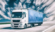 Transport von Gütern mit LKW - fahrender Lastkraftwagen auf der Autobahn // shipping 