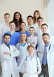 © Africa Studio - A group of doctors and nurses standing on the stairs in the hospital, indoors