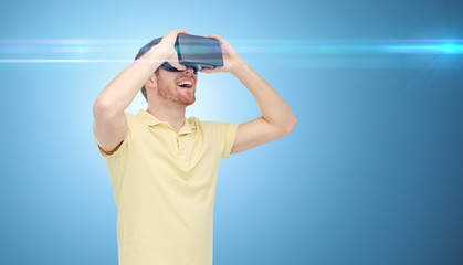 Wall Mural - happy man in virtual reality headset or 3d glasses