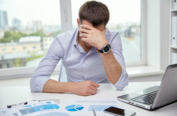 Sticker - stressed businessman with papers in office