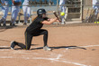 canvas print picture - Fast high school softball player bunting the ball. 