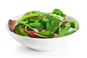 Bowl with fresh green salad isolated on white background (spinac