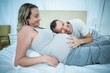 © WavebreakmediaMicro - Man listening the belly of pregnant woman
