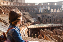 Young Girl With Backpack Exploring Inside The Colosseum (Coliseum)