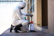 © WavebreakMediaMicro - Side view of a man doing pest control