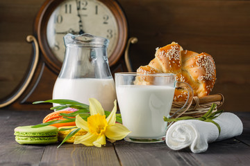 Breakfast with spring flowers and fresh milk