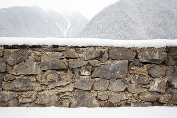 Bricks wall in snow