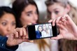 © WavebreakmediaMicro - Young female friends taking selfie