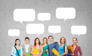 Wall Mural - group of teenage students with folders and bags