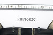 word rhetoric  typed on old typewriter