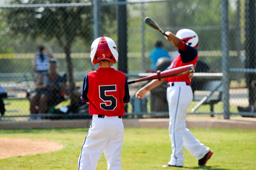 Youth baseball boys batting