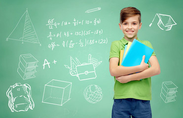 Wall Mural - happy student boy with folders and notebooks