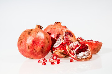 Ripe pomegranate fruit isolated