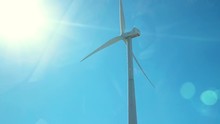 View Of Windmill Against Blue Sky, Super Slow Motion 240fps

