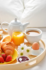 Wall Mural - Breakfast tray in bed in hotel room